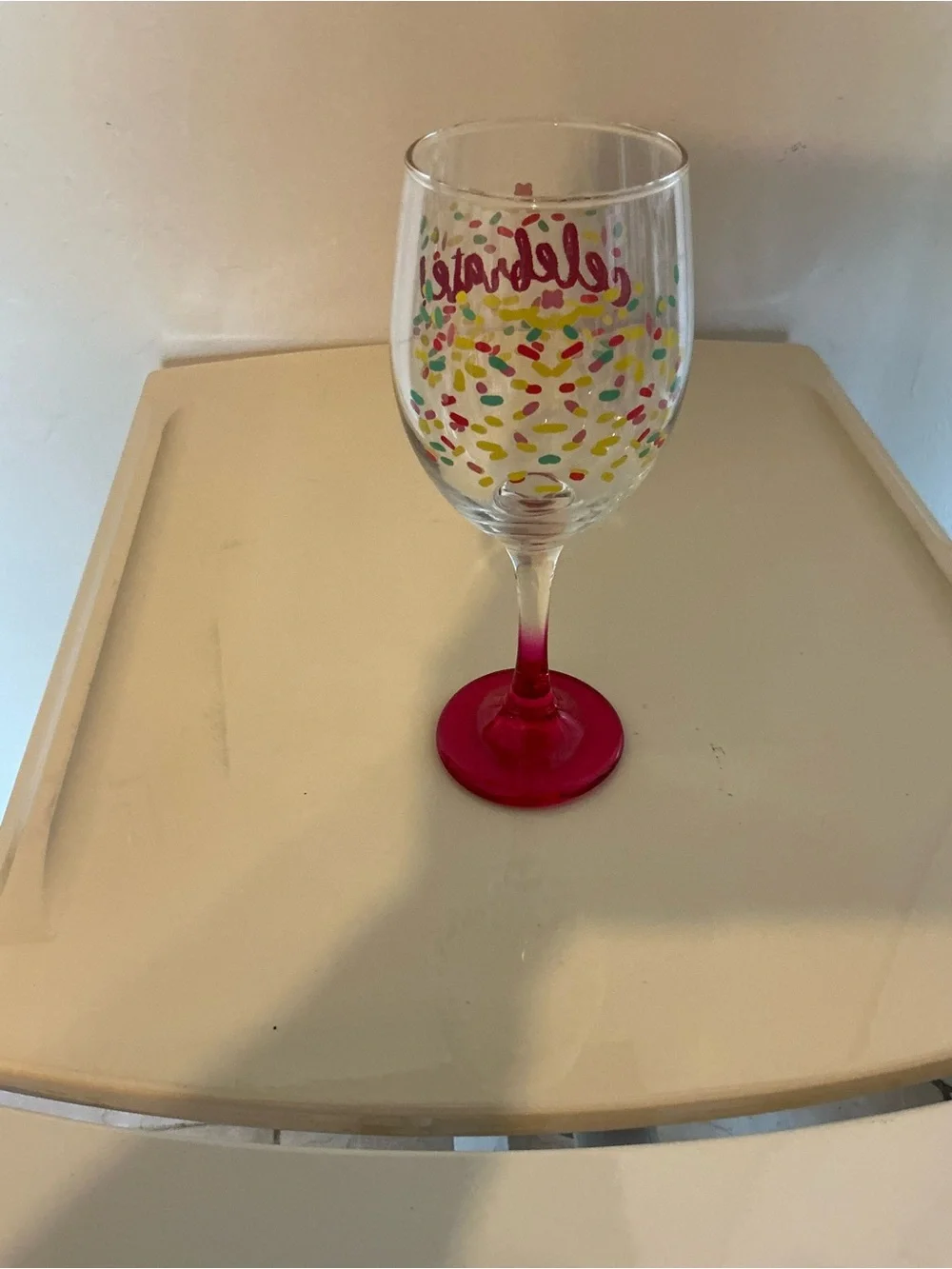 Hand Painted Celebrate Pink Stemmed Wine Glass with colorful Confetti Design